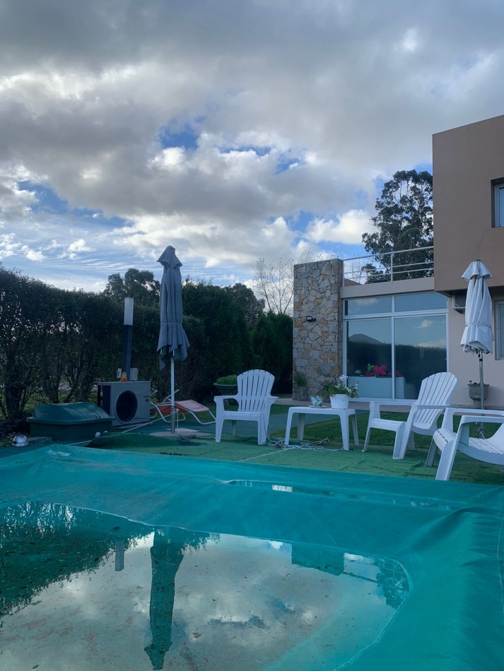 CASA DE CORTE MODERNO  CON  PILETA CLIMATIZADA   CON USO DE VERANO-FINANCIA- ACEPTA PERMUTA - BARRIO PRIVADO TIERRA DEL MAR 